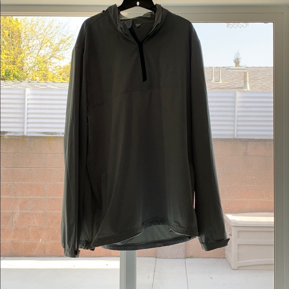Travis Mathews light grey wind breaker